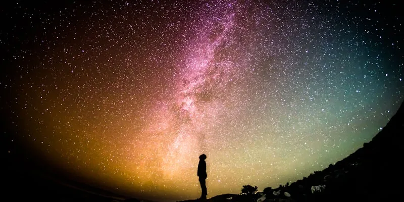 A star-filled night sky forming constellations, an image of two maps of the self