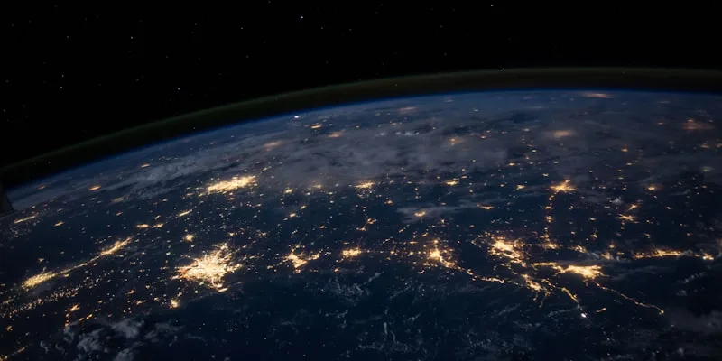 Night sky with stars over the horizon